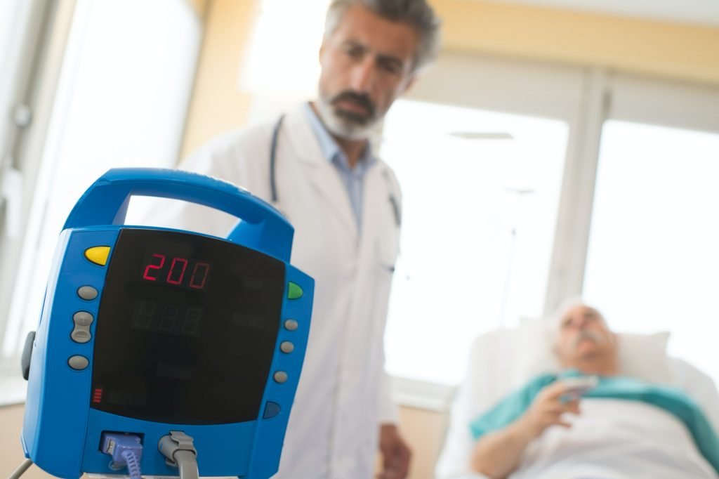 medical device doctor and patient in the recovery room