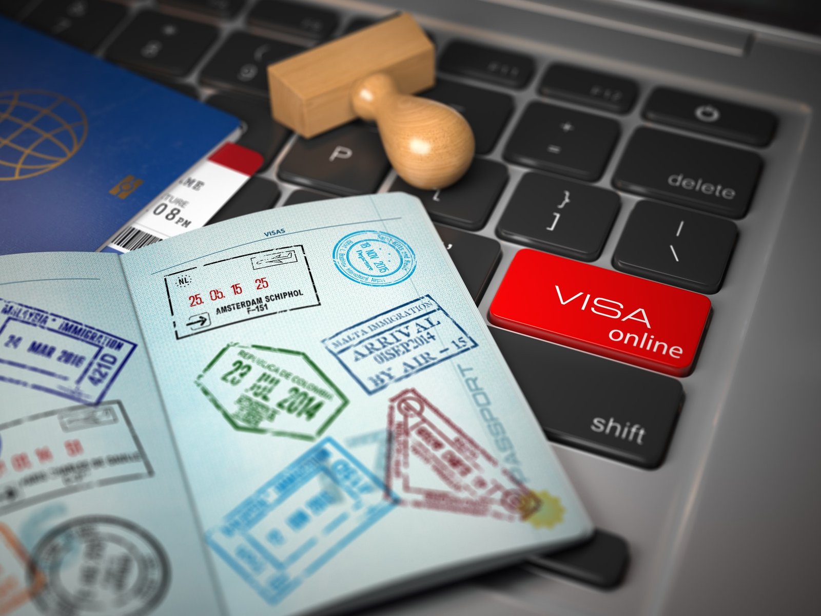 Visa online application concept. Open passport with visa stamps|