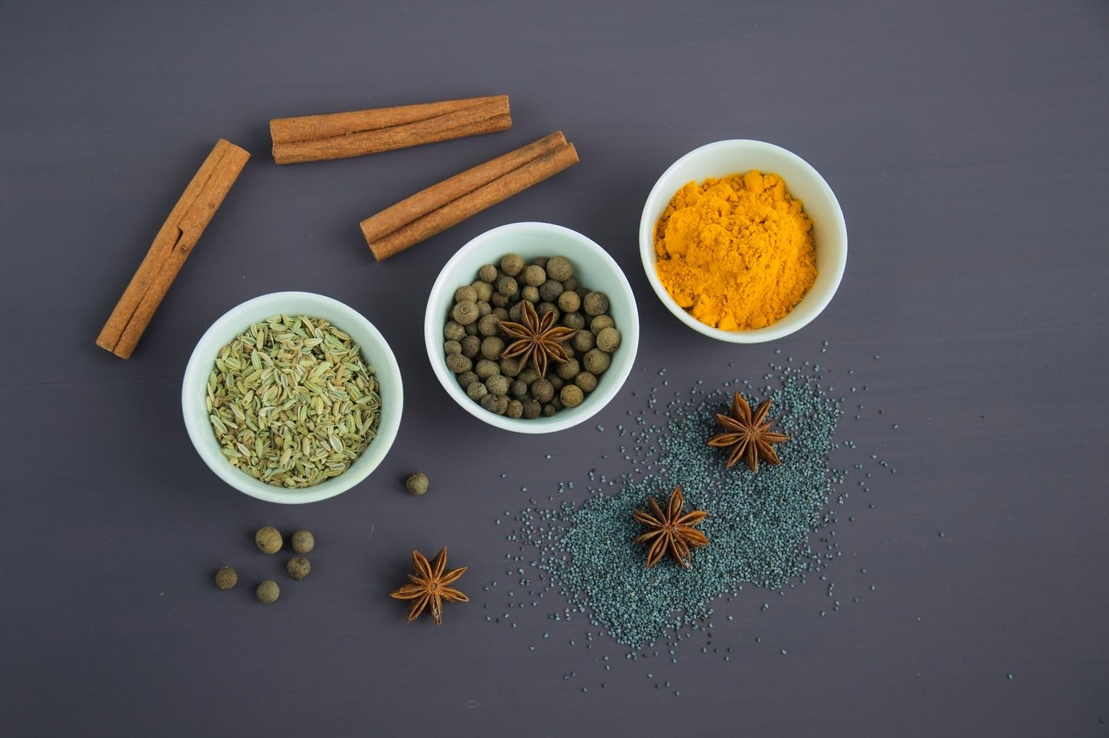assorted spices near white ceramic bowls|assorted spices near white ceramic bowls